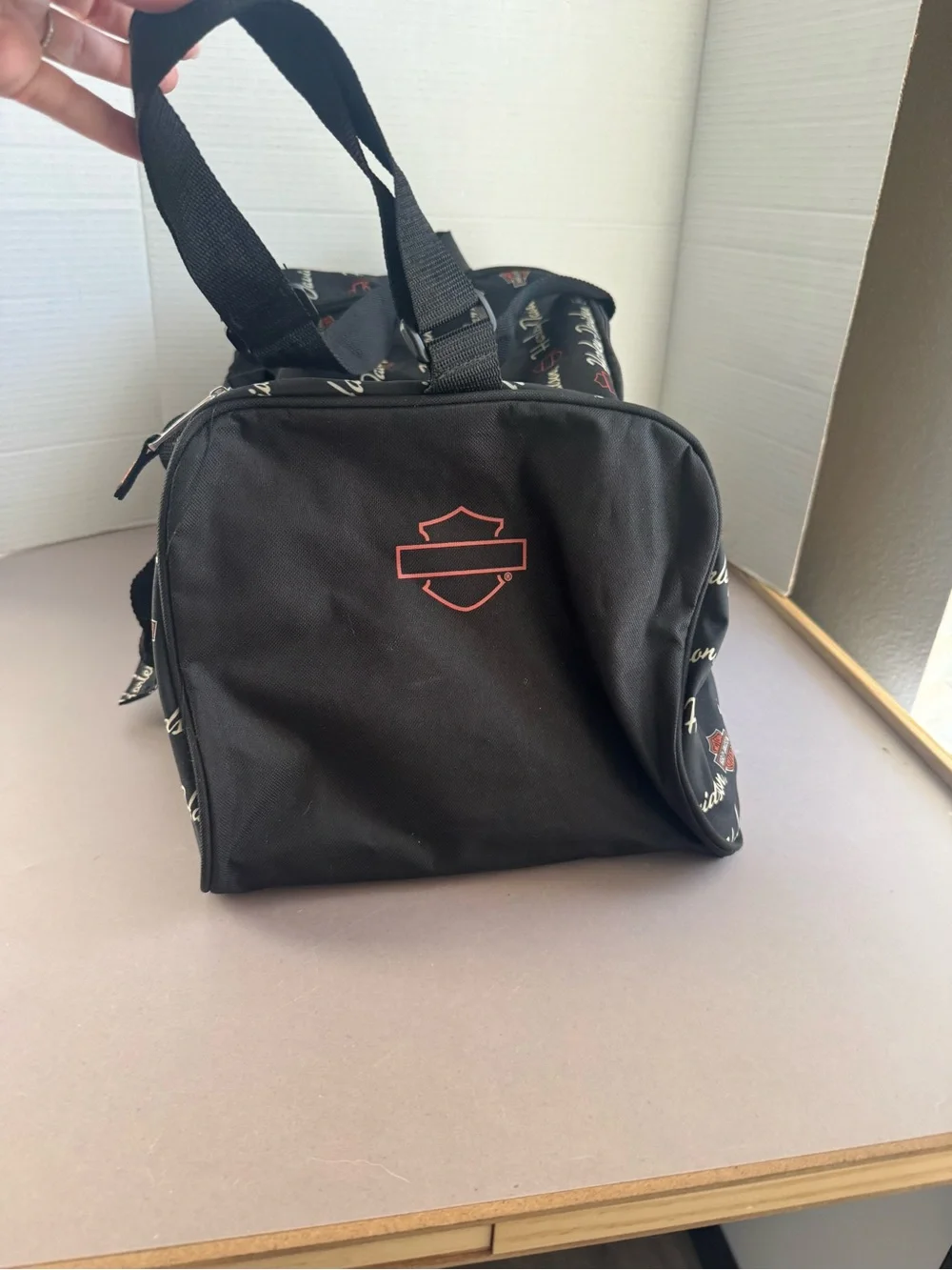 Harley-Davidson Black Duffel with White Script and Orange Accents